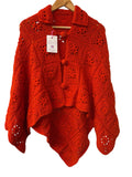 Poncho all'uncinetto fiorito